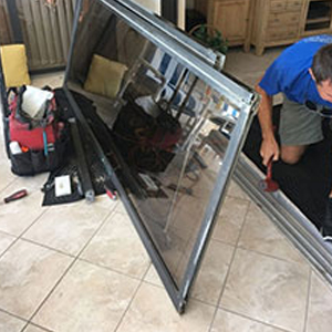 sliding glass door frame repair Nassau